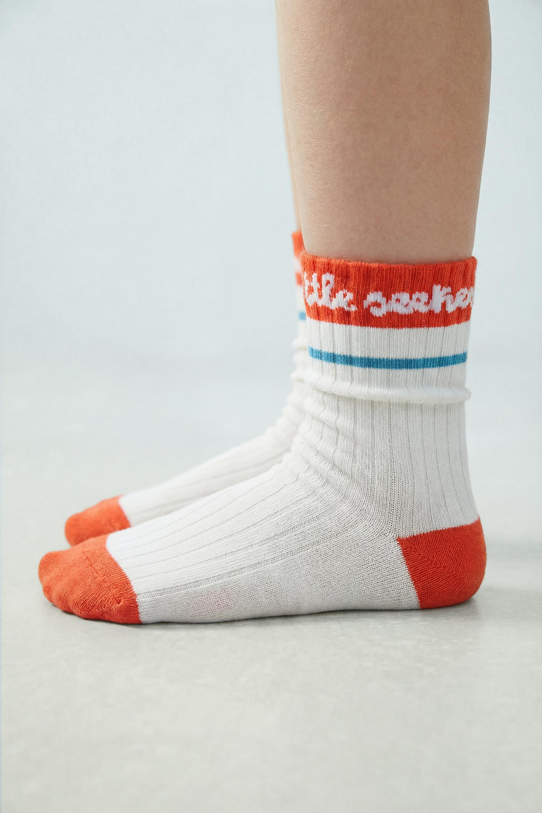 THREE-PACK OF LONG STRIPED SOCKS ISABELLE VANDEPLASSCHE ©